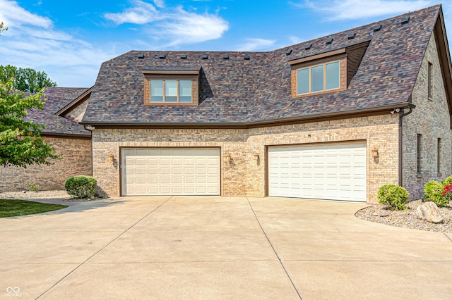 4181 Whitetail Woods Dr, Bargersville, IN 46106 - view of front facade with concrete driveway, brick siding, and a garage
