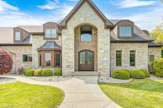 4181 Whitetail Woods Dr, Bargersville, IN 46106 - view of front of home featuring a front lawn, french doors, roof with shingles, and brick siding