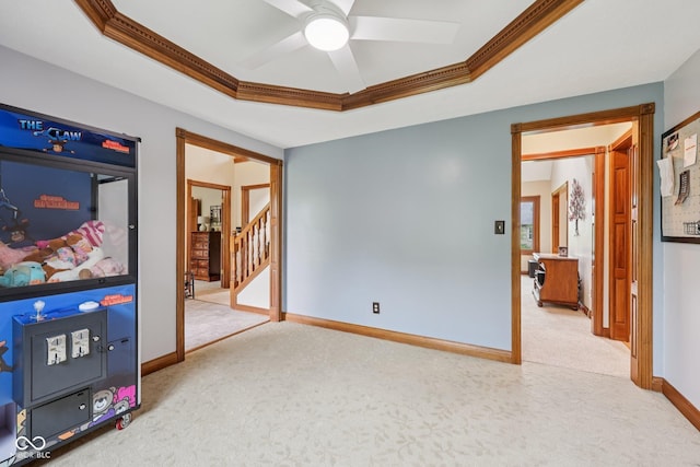 6983 White Oak Dr, Avon, IN 46123 - unfurnished bedroom featuring a tray ceiling, ornamental molding, carpet, and baseboards
