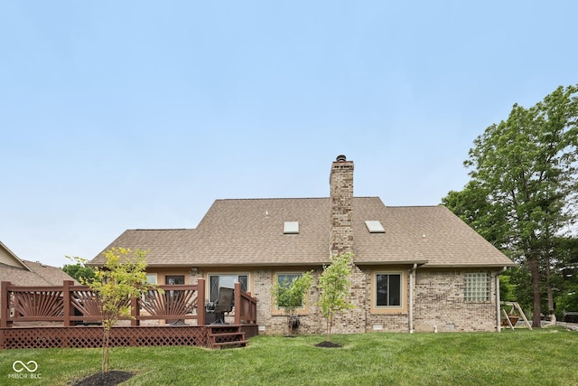 6983 White Oak Dr, Avon, IN 46123 - back of house featuring a lawn, a wooden deck, brick siding, and a chimney