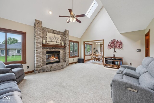 6983 White Oak Dr, Avon, IN 46123 - living area with plenty of natural light, a ceiling fan, high vaulted ceiling, carpet, and baseboards