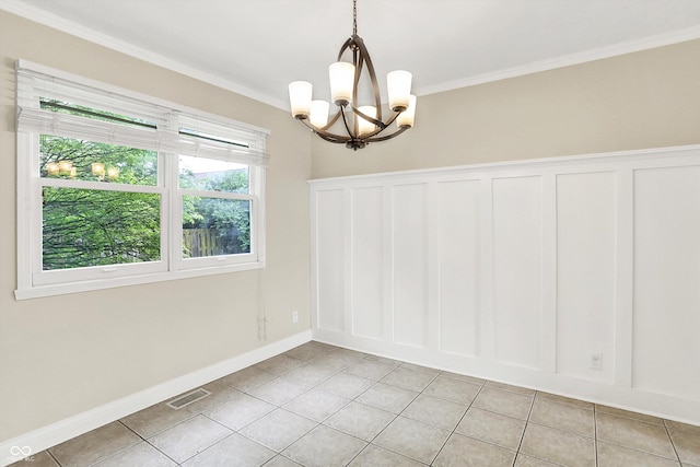 7430 Railway Ct, Indianapolis, IN 46256 - empty room with a chandelier, light tile patterned flooring, crown molding, and baseboards