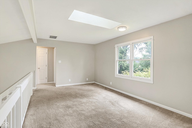 7430 Railway Ct, Indianapolis, IN 46256 - unfurnished room with a skylight, light colored carpet, and baseboards