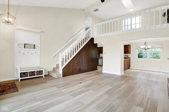7430 Railway Ct, Indianapolis, IN 46256 - unfurnished living room featuring a chandelier, stairway, wood finished floors, high vaulted ceiling, and beamed ceiling