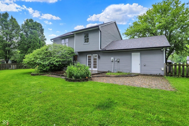 7430 Railway Ct, Indianapolis, IN 46256 - back of house featuring a patio area, french doors, and roof with shingles