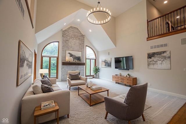 1188 Old Eagle Way, Greenwood, IN 46143 - living room with high vaulted ceiling, a chandelier, recessed lighting, baseboards, and wood finished floors