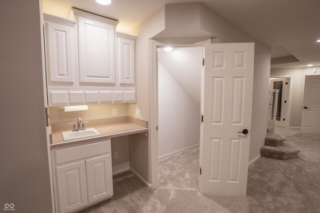 1188 Old Eagle Way, Greenwood, IN 46143 - bar with a sink, light colored carpet, baseboards, and recessed lighting