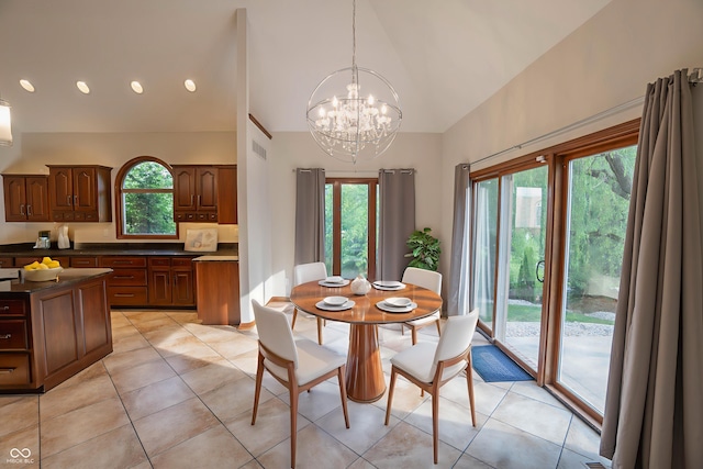 1188 Old Eagle Way, Greenwood, IN 46143 - dining space with high vaulted ceiling, a chandelier, light tile patterned floors, and recessed lighting