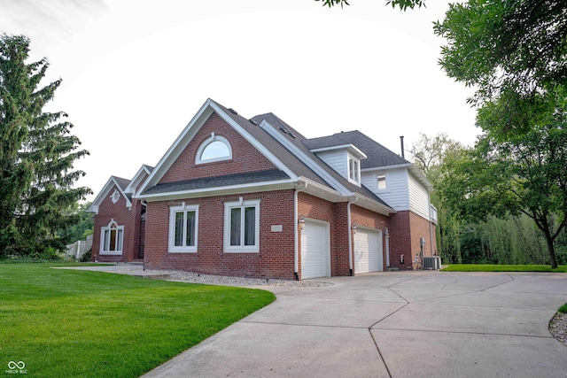 1188 Old Eagle Way, Greenwood, IN 46143 - view of front of home with driveway, a garage, brick siding, a front yard, and cooling unit
