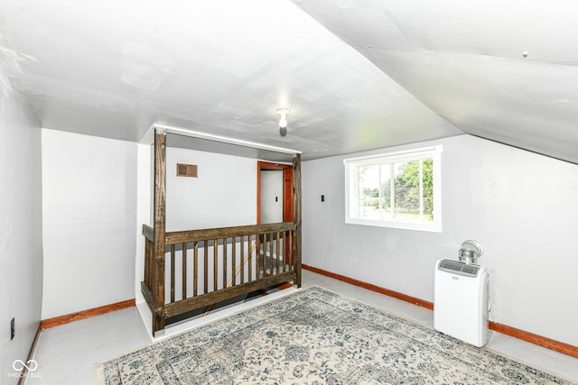 402 E 4th St, Sheridan, IN 46069 - additional living space with baseboards and lofted ceiling