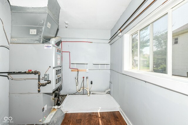 402 E 4th St, Sheridan, IN 46069 - utility room featuring heating unit