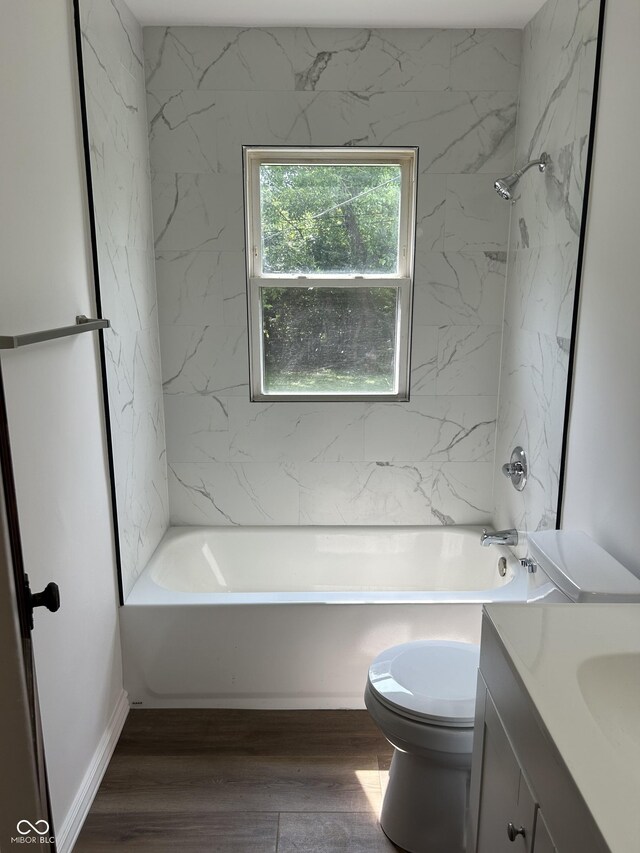 330 S Butler Ave, Indianapolis, IN 46219 - full bath with vanity, shower / bathtub combination, and wood finished floors