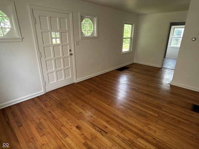 330 S Butler Ave, Indianapolis, IN 46219 - entrance foyer featuring healthy amount of natural light and wood-type flooring