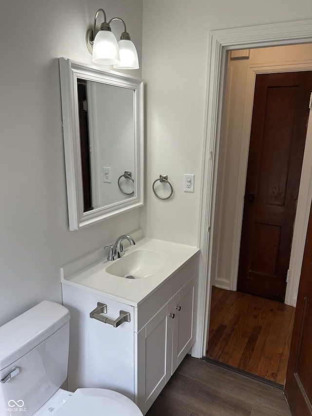 330 S Butler Ave, Indianapolis, IN 46219 - bathroom featuring vanity and wood finished floors