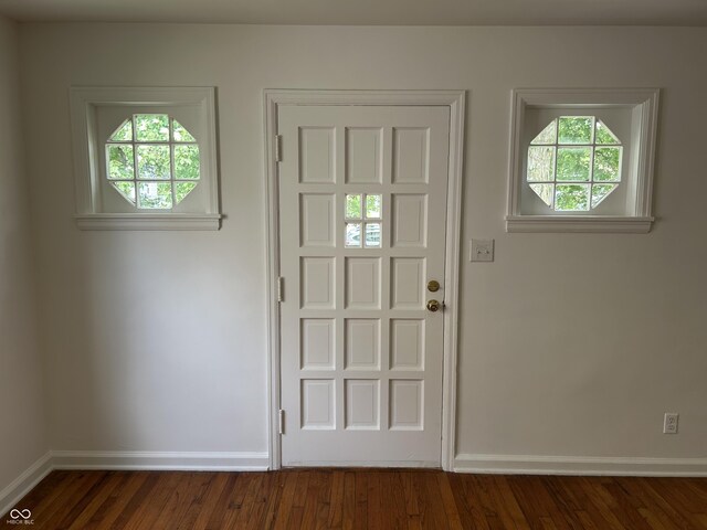 330 S Butler Ave, Indianapolis, IN 46219 - entryway with baseboards and dark wood finished floors