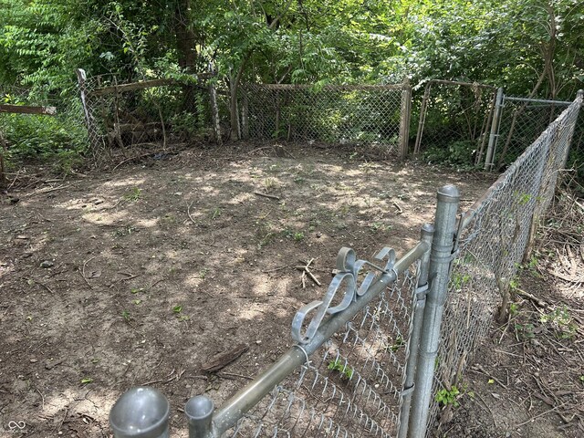 330 S Butler Ave, Indianapolis, IN 46219 - view of yard with a gate