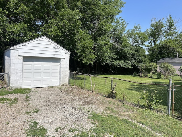 330 S Butler Ave, Indianapolis, IN 46219 - detached garage with gravel driveway