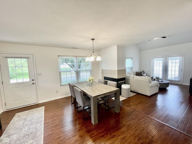 9664 Legare St Unit 2601, Fishers, IN 46038 - dining space featuring healthy amount of natural light, dark wood-style flooring, and vaulted ceiling