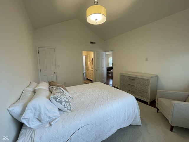 9664 Legare St Unit 2601, Fishers, IN 46038 - bedroom with high vaulted ceiling, carpet flooring, and ensuite bath