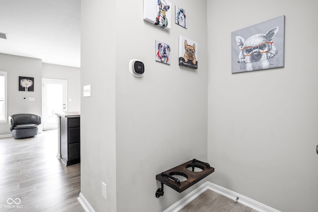 6305 N Woodhaven Dr, Mccordsville, IN 46055 - corridor with light wood-style flooring and baseboards