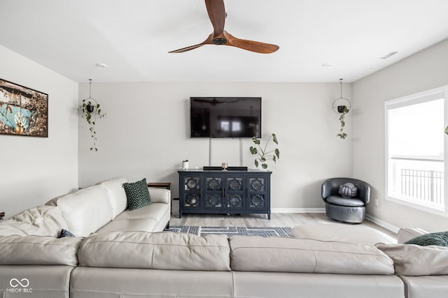 6305 N Woodhaven Dr, Mccordsville, IN 46055 - living room with ceiling fan, baseboards, and wood finished floors