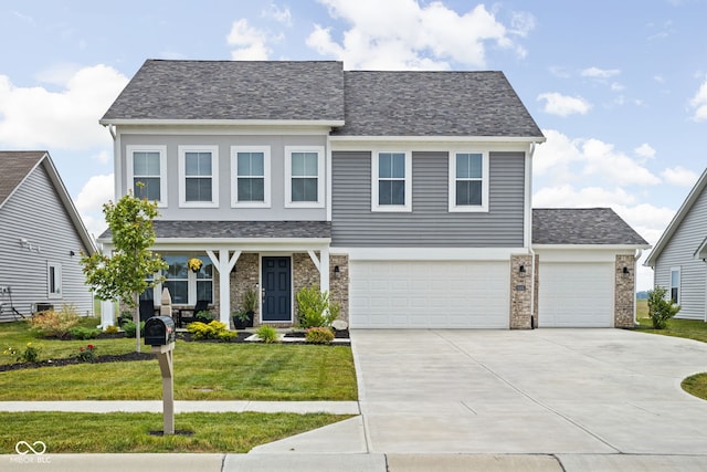 6305 N Woodhaven Dr, Mccordsville, IN 46055 - view of front of house featuring driveway, a front lawn, an attached garage, and roof with shingles