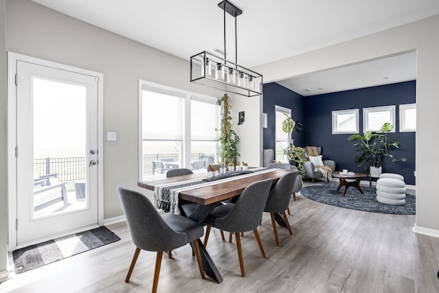 6305 N Woodhaven Dr, Mccordsville, IN 46055 - dining room featuring wood finished floors and baseboards