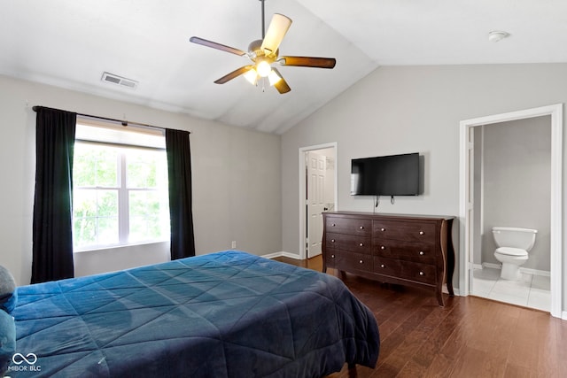 603 Daviess Dr, Westfield, IN 46074 - bedroom with vaulted ceiling, wood finished floors, baseboards, connected bathroom, and ceiling fan