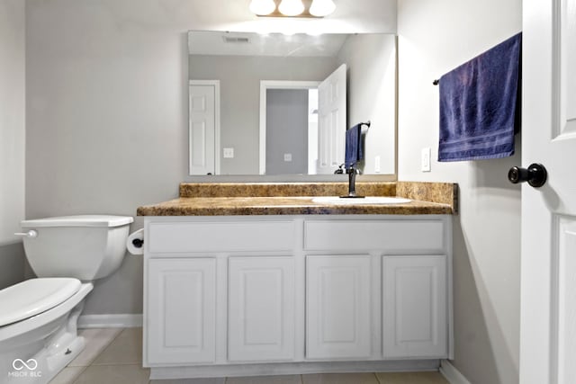 603 Daviess Dr, Westfield, IN 46074 - bathroom with toilet, vanity, tile patterned flooring, and baseboards