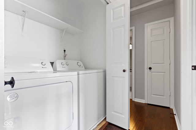 603 Daviess Dr, Westfield, IN 46074 - washroom featuring washing machine and dryer and dark wood finished floors