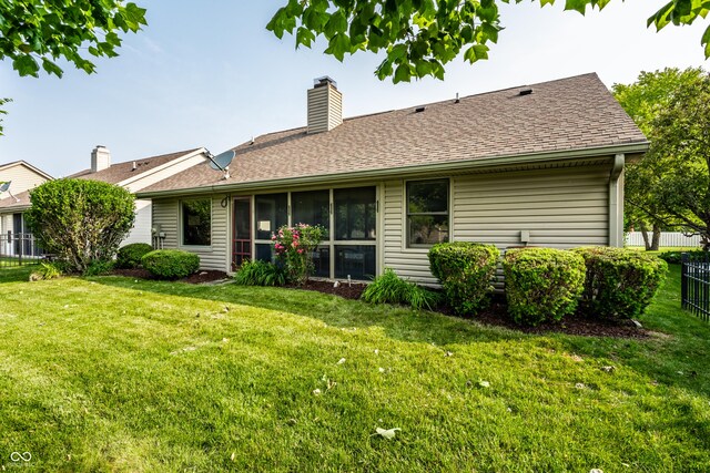 8223 Thoroughbred Run, Indianapolis, IN 46256 - back of property with a chimney and a shingled roof