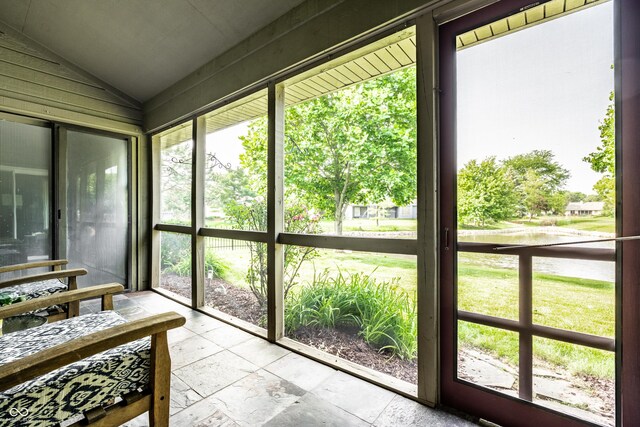 8223 Thoroughbred Run, Indianapolis, IN 46256 - sunroom / solarium featuring lofted ceiling, plenty of natural light, and a water view