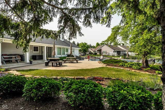 8223 Thoroughbred Run, Indianapolis, IN 46256 - rear view of house with a patio