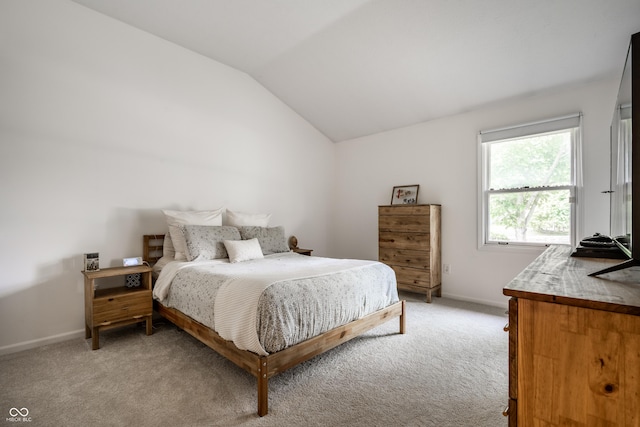 8223 Thoroughbred Run, Indianapolis, IN 46256 - bedroom featuring light carpet, baseboards, and vaulted ceiling