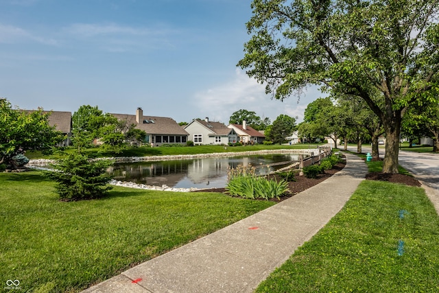 8223 Thoroughbred Run, Indianapolis, IN 46256 - surrounding community with a water view, a lawn, and a residential view