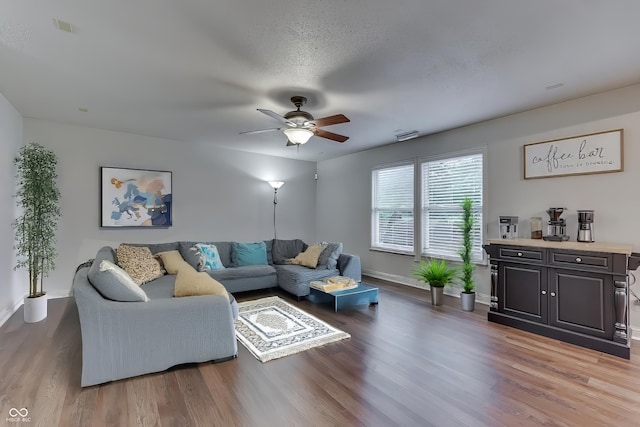 10510 Mcclain Dr, Brownsburg, IN 46112 - living room with wood finished floors and a ceiling fan