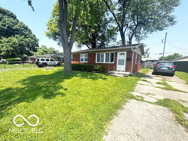 1820 Martin St, Indianapolis, IN 46237 - ranch-style home with brick siding and driveway