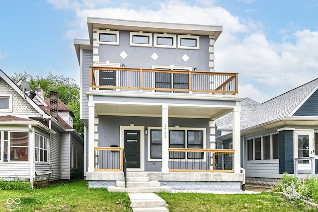 1723 Fletcher Ave, Indianapolis, IN 46203 - contemporary home with a balcony, stucco siding, and covered porch