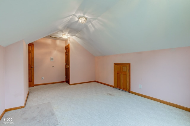 8371 N 400 W, Fairland, IN 46126 - additional living space featuring light carpet, vaulted ceiling, and baseboards