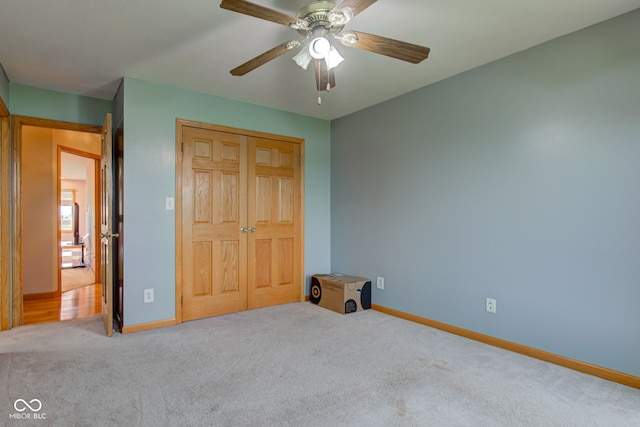8371 N 400 W, Fairland, IN 46126 - carpeted bedroom with a closet, baseboards, and ceiling fan