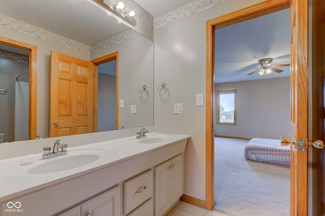 8371 N 400 W, Fairland, IN 46126 - full bathroom with double vanity, ceiling fan, baseboards, and ensuite bathroom