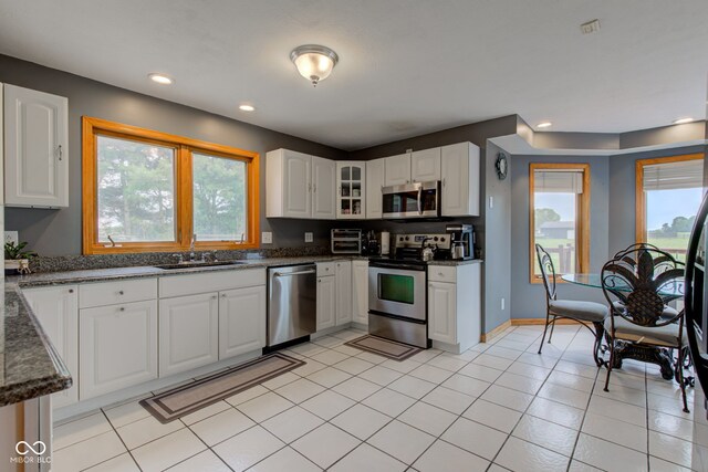 8371 N 400 W, Fairland, IN 46126 - kitchen with appliances with stainless steel finishes, a sink, glass insert cabinets, white cabinetry, and recessed lighting