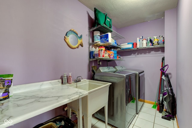 8371 N 400 W, Fairland, IN 46126 - washroom featuring washer and dryer, a textured ceiling, and light tile patterned floors