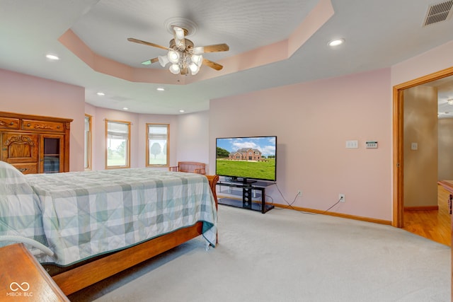 8371 N 400 W, Fairland, IN 46126 - bedroom featuring light carpet, recessed lighting, baseboards, ceiling fan, and a raised ceiling