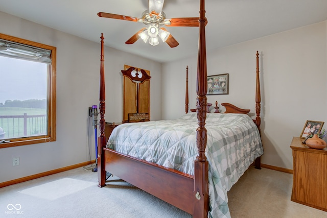 8371 N 400 W, Fairland, IN 46126 - bedroom with carpet flooring, baseboards, and ceiling fan