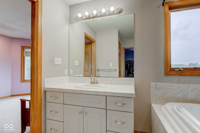 8371 N 400 W, Fairland, IN 46126 - full bathroom with vanity, a bath, plenty of natural light, and baseboards