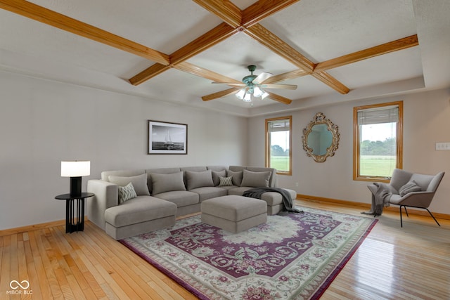 8371 N 400 W, Fairland, IN 46126 - living room with coffered ceiling, baseboards, light wood-style floors, a ceiling fan, and beamed ceiling