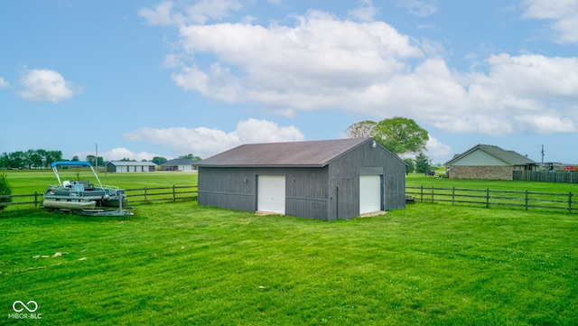 8371 N 400 W, Fairland, IN 46126 - view of yard featuring a garage and an outbuilding