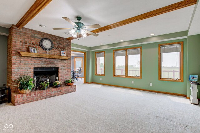 8371 N 400 W, Fairland, IN 46126 - unfurnished living room with carpet, a fireplace, a ceiling fan, beam ceiling, and recessed lighting