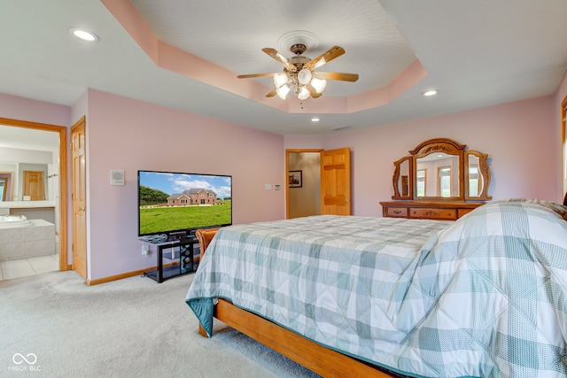 8371 N 400 W, Fairland, IN 46126 - bedroom with recessed lighting, light colored carpet, baseboards, a raised ceiling, and ensuite bath
